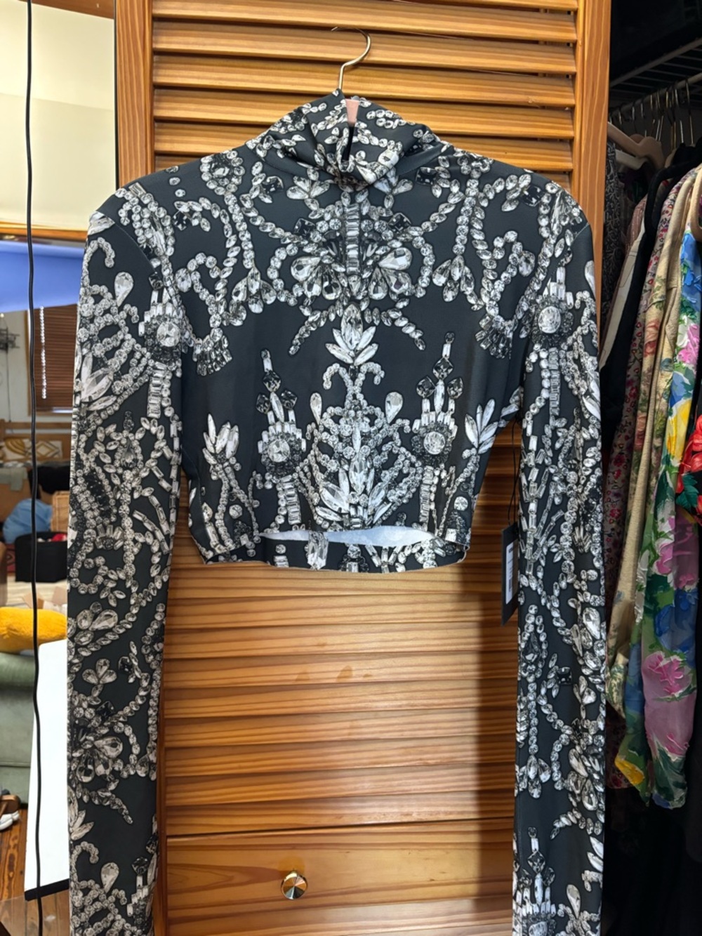 Norma Kamali long sleeve slim fit turtleneck crop top with bejeweled print